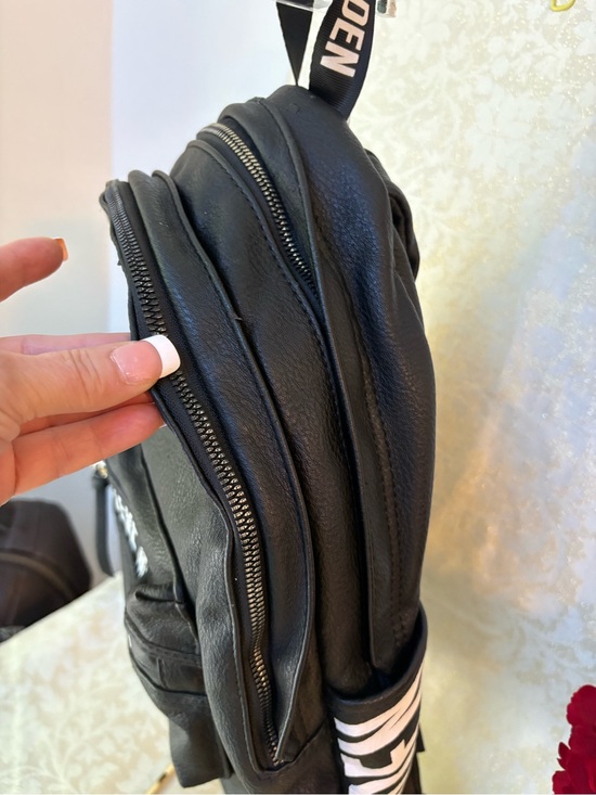 black faux leather backpack with pockets Women's Full Grain Genuine Leather College Bag for Work or Travel The Sloan Mini also features an interior neoprene sleeve fitting up to an 11” tablet A|X Armani Exchange Men's Pebbled